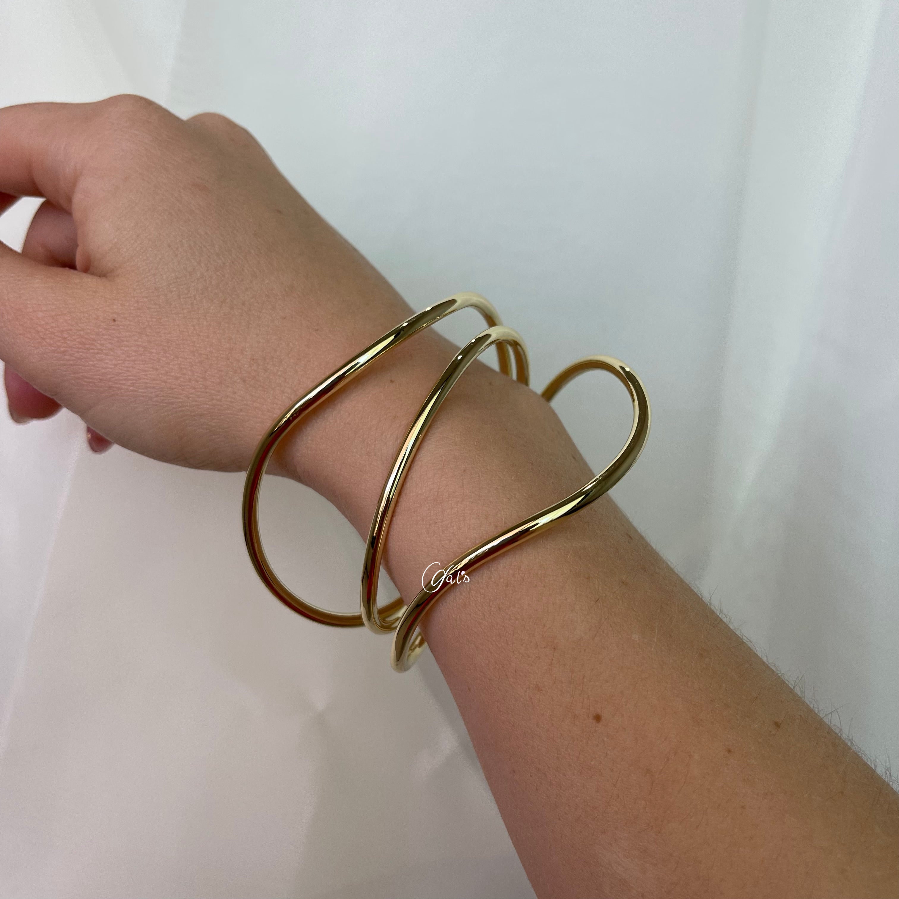 Brazalete Lazos Torcidos Oro