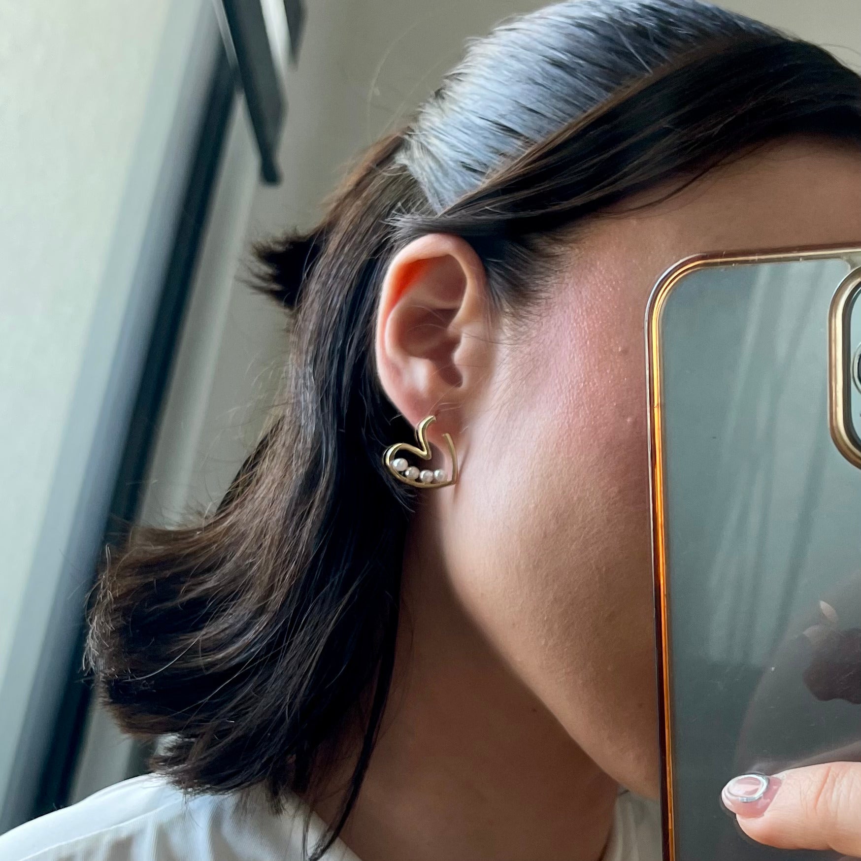 Aretes corazón con perlas